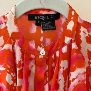 Silk sleeveless blouse with front tie sash